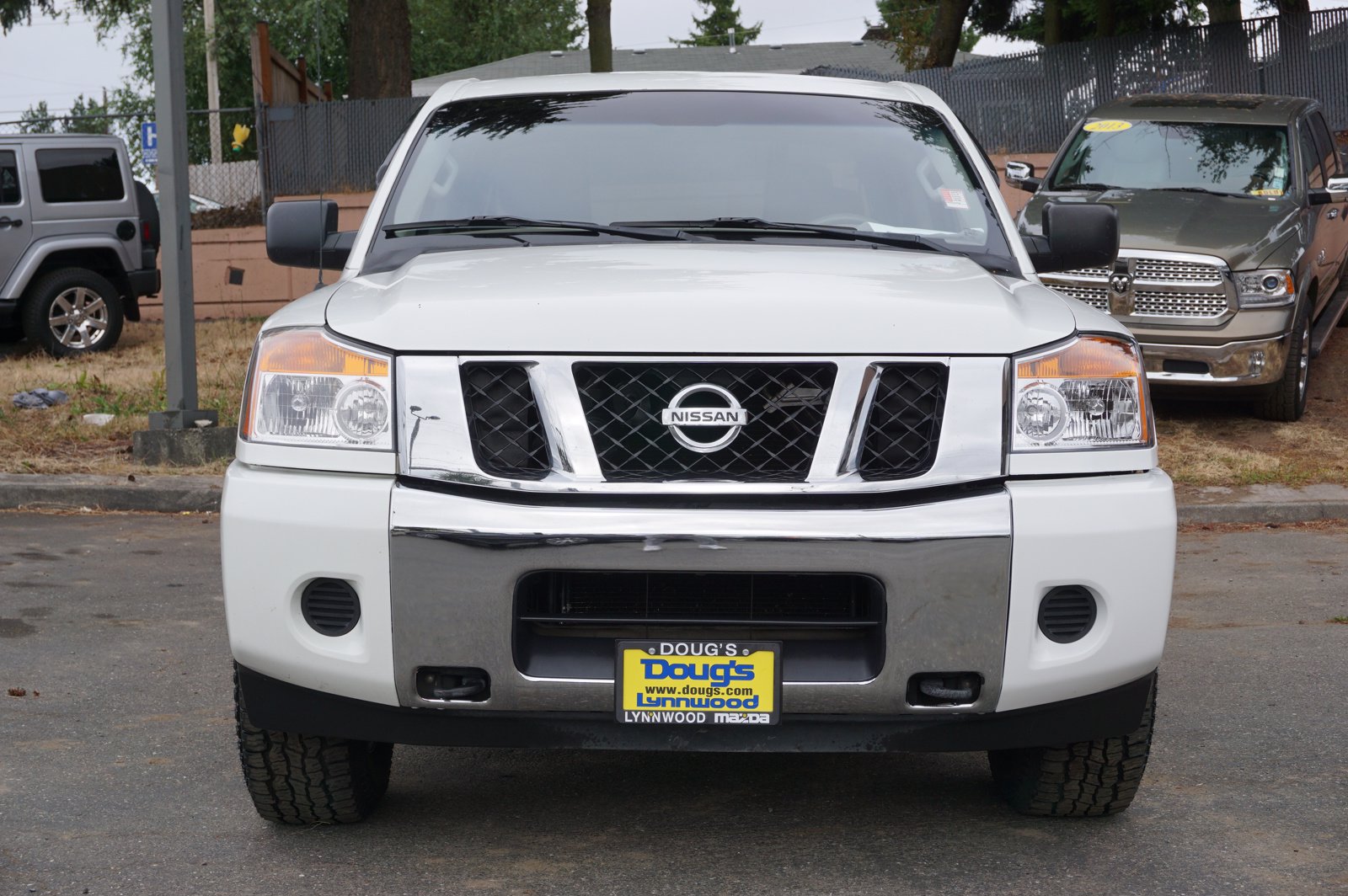 Pre-Owned 2013 Nissan Titan SV Crew Cab Pickup