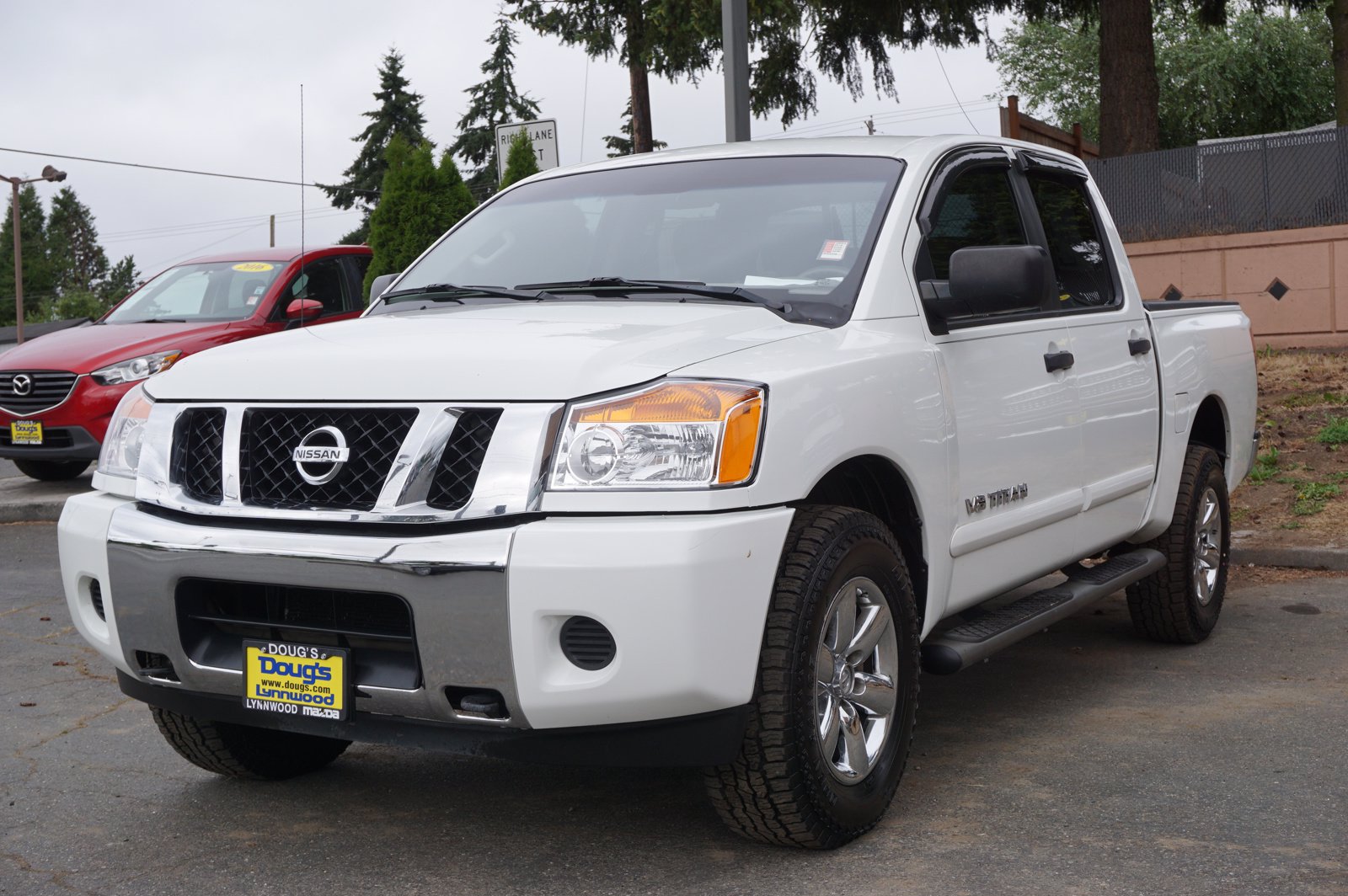 Pre-Owned 2013 Nissan Titan SV Crew Cab Pickup